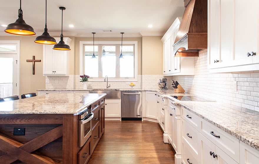 The beautiful grain of Ash Natural stands out in this classic white painted kitchen.