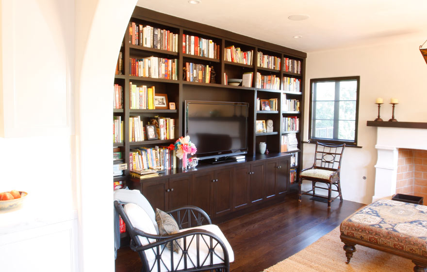 A delightful built-in entertainment center with a customized door style makes a great focal point in any home.