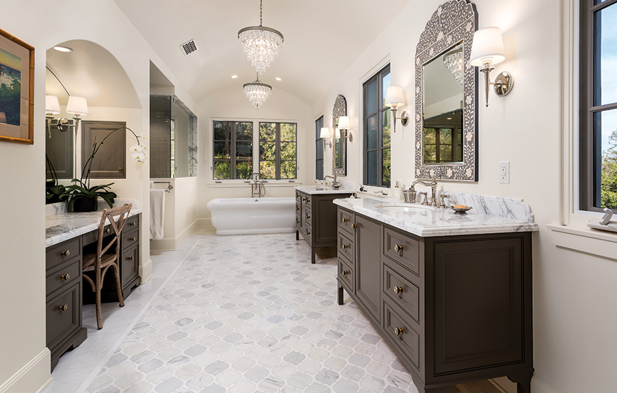 Beautifully painted custom designed doors add to the dramatic element of this breathtaking bathroom. 