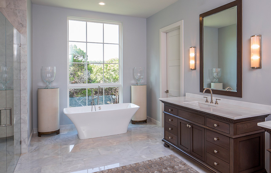 The light color pallete allows the woodgrain to draw attention in this elegant bathroom. 