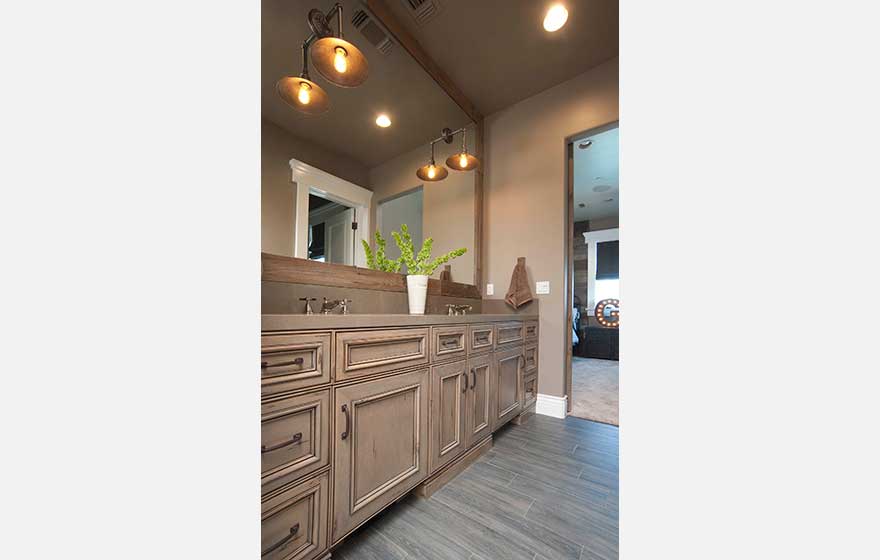 Distressed Berrington 3/4" (391) Doors are a perfect fit for this rustic, chic,  Jack and Jill bathroom.