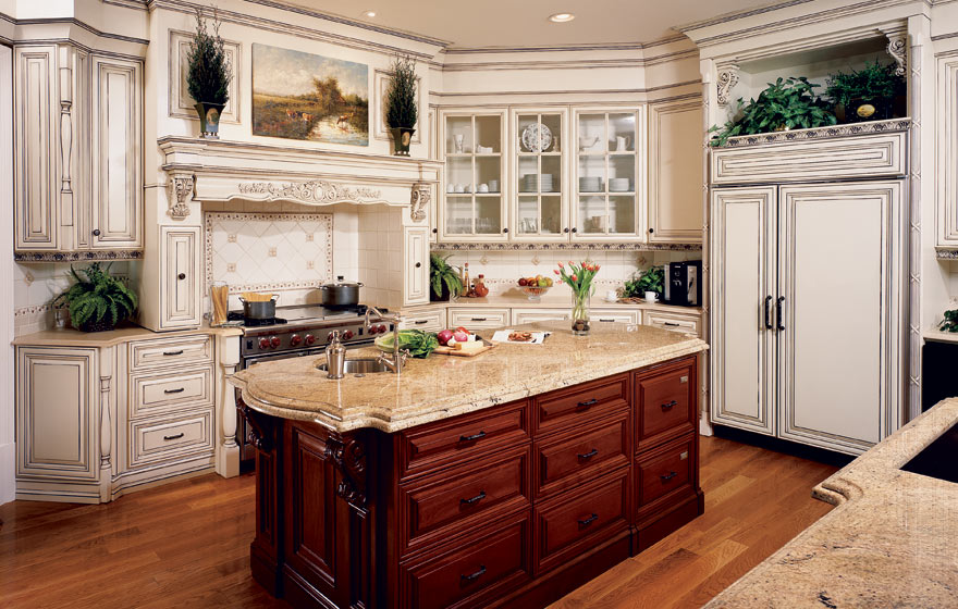 Honduras Mahogany dazzles on the island while the white cabinetry provide an open and airy look for this southern home.