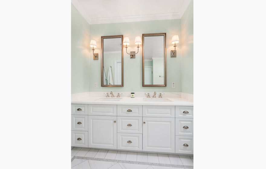 Featuring neutral coastal colors, this bathroom fosters a peaceful and relaxing atmosphere.