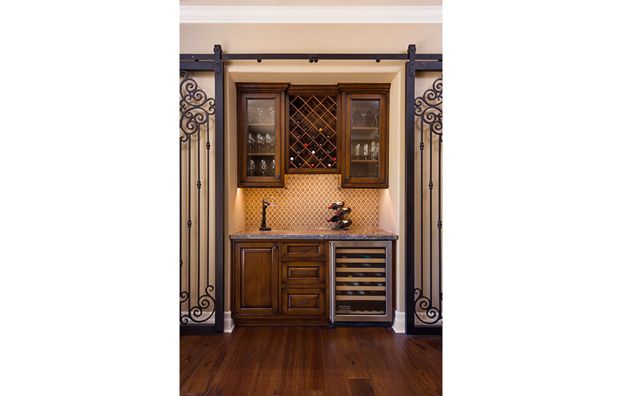 Tucked into a nook in the wall, this custom built-in wine area is both functional and beautiful.