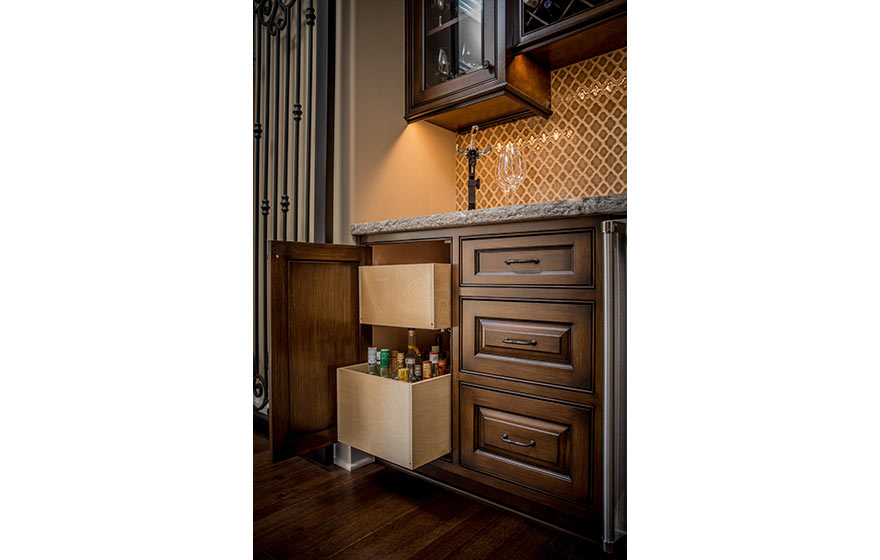 Tucked into a nook in the wall, this custom built-in wine area is both functional and beautiful.