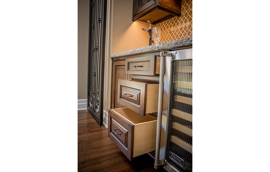 Tucked into a nook in the wall, this custom built-in wine area is both functional and beautiful.