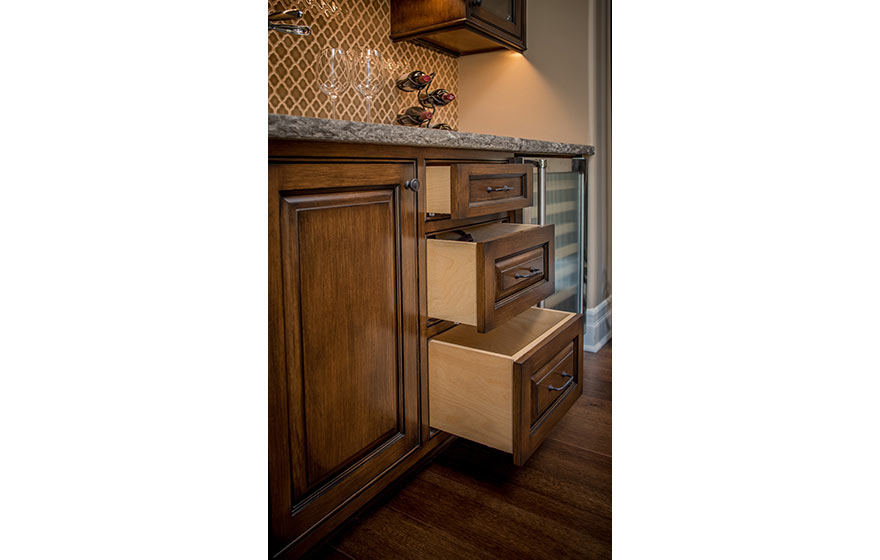 Tucked into a nook in the wall, this custom built-in wine area is both functional and beautiful.