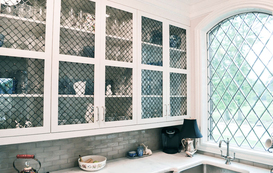 Clean Shaker 3/4" (831) lines with interesting inserts make this butler's pantry a must-see space.