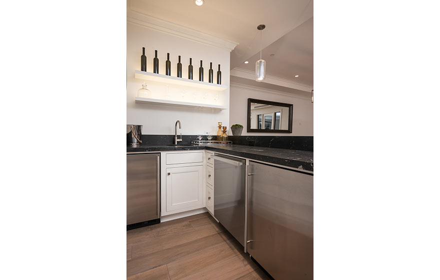 Petite built-in bars are a perfect solution for downstairs gathering areas.